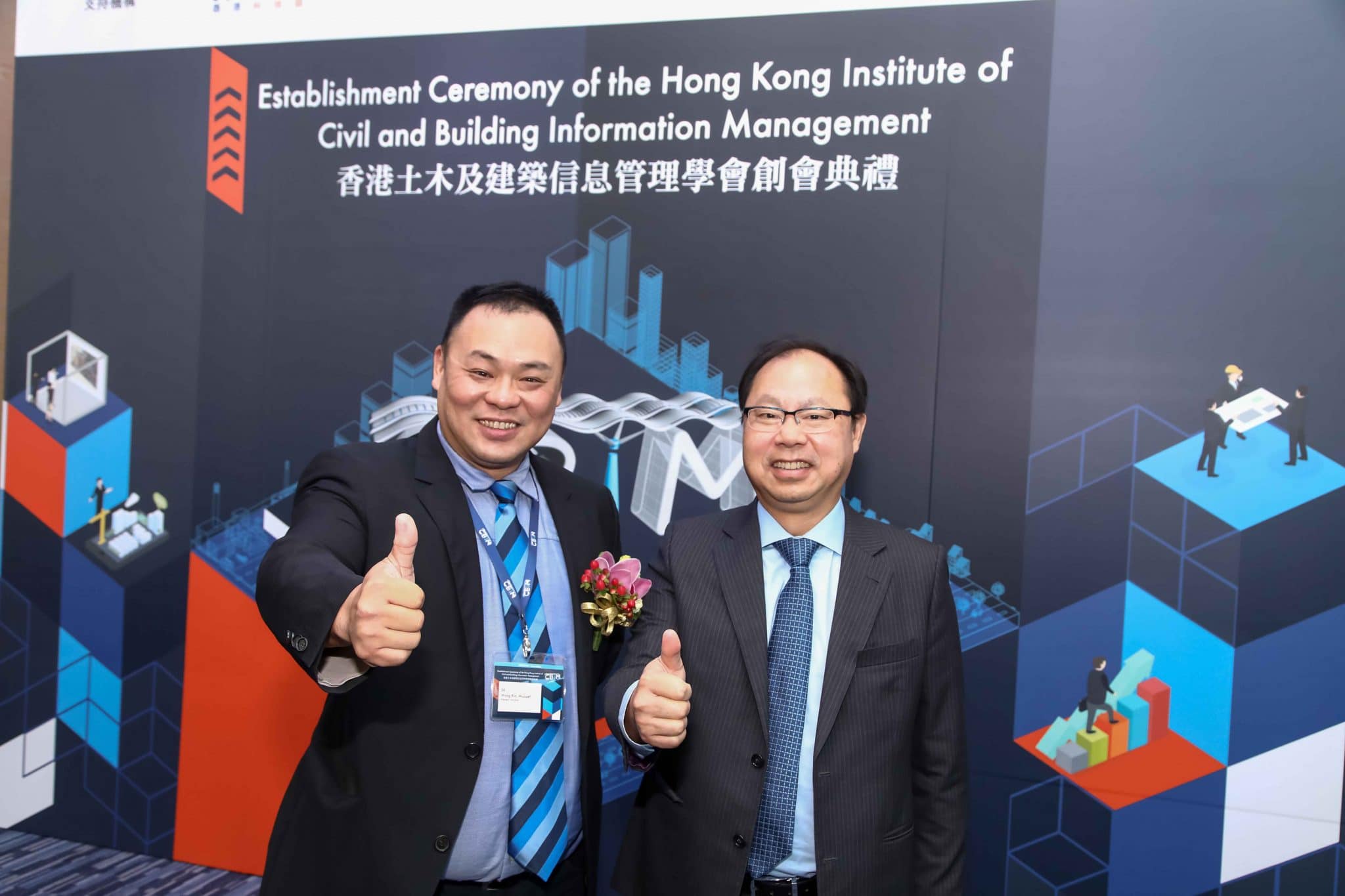 Founding President of HKICBIM, Sr. Michael Wong (left) gestured with guest after the ceremony.